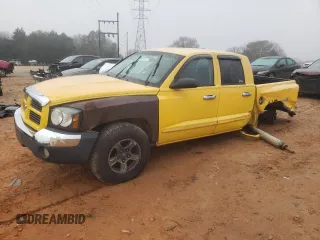 2006 Dodge Dakota SLT with VIN 1D7HE48J26S674761, listed as a Copart auction lot 87274284 with 153,147 mi miles and Salvage title. Bid and sale history available at DreamBid. Image 1.