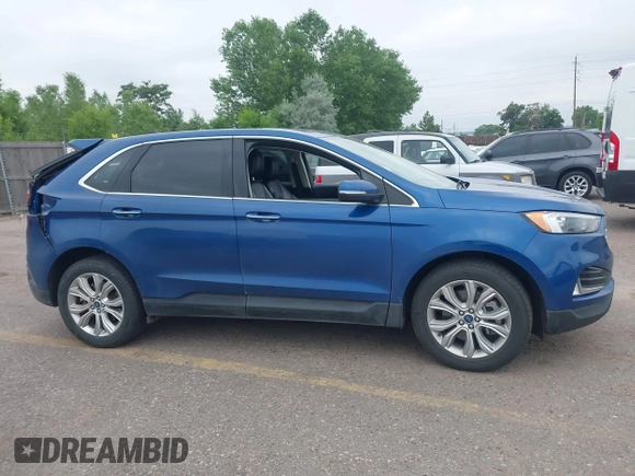 2022 Ford Edge Titanium with VIN 2FMPK4K95NBB05789, listed as a IAAI auction lot 42582372 with 58,379 mi miles and . Bid and sale history available at DreamBid. Image 13.