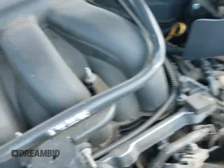 2005 Ford Taurus SE z VIN 1FAFP53U55A101821, wystawiony jako IAAI lot #43171073 z przebiegiem 147 132 mil mil oraz . Historia ofert i sprzedaży dostępna na DreamBid. Obrazek 19.