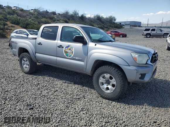 2015 Toyota Tacoma with VIN 3TMLU4EN2FM179631, listed as a Copart auction lot 57769855 with 106,288 mi miles and Salvage title. Bid and sale history available at DreamBid. Image 4.
