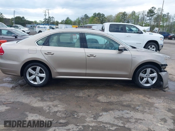2015 Volkswagen Passat 1.8T Limited Edition with VIN 1VWAT7A32FC120769, listed as a IAAI auction lot 42013547 with 61,451 mi miles. Bid and sale history available at carsss.com. Image 13.