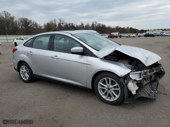 2018 Ford Focus SE with VIN 1FADP3F22JL250739, listed as a Copart auction lot 50523285 with 51,774 mi miles and Salvage Title. Bid and sale history available at carsss.com. Image 4.