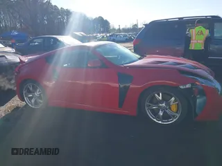 2009 Nissan 370Z Touring with VIN JN1AZ44E19M401881, listed as a IAAI auction lot 41183986 with 127,000 mi miles and . Bid and sale history available at DreamBid. Image 13.