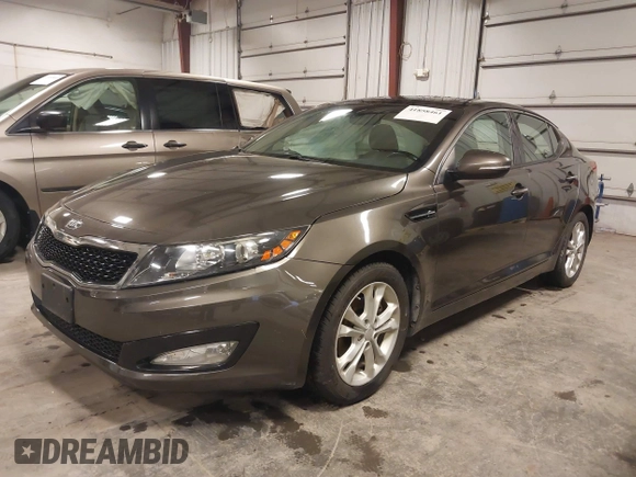 2013 Kia Optima EX with VIN 5XXGN4A72DG120129, listed as a IAAI auction lot 41858461 with 138,627 mi miles. Bid and sale history available at carsss.com. Image 2.