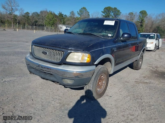 2001 Ford F-150 SuperCrew XLT with VIN 1FTRW08L61KE48995, listed as a IAAI auction lot 41575268 with NaN miles. Bid and sale history available at carsss.com. Image 2.