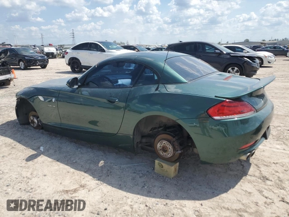 2011 BMW Z4 sDrive30i with VIN WBALM5C55BE495921, listed as a Copart auction lot 71453304 with 116,136 mi miles and Salvage Title. Bid and sale history available at carsss.com. Image 2.
