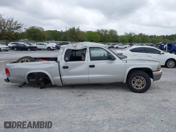 2003 Dodge Dakota SLT with VIN 1D7HL48N13S274856, listed as a IAAI auction lot 41954038 with 306,728 mi miles. Bid and sale history available at carsss.com. Image 13.
