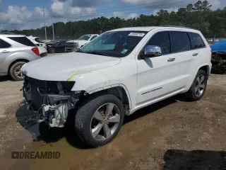 2015 Jeep Grand Cherokee Overland with VIN 1C4RJECG2FC719042, listed as a Copart auction lot 60800215 with 130,380 mi miles and Salvage title. Bid and sale history available at DreamBid. Image 1.
