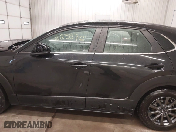 2021 Mazda CX-30 S with VIN 3MVDMBAL2MM265207, listed as a IAAI auction lot 41566325 with 62,587 mi miles and . Bid and sale history available at carsss.com. Image 14.