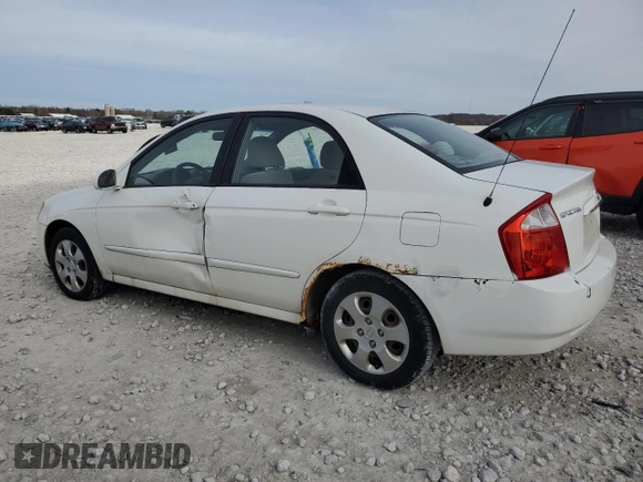 2006 Kia Spectra EX with VIN KNAFE121265208526, listed as a Copart auction lot 80300604 with 101,780 mi miles and Salvage Title. Bid and sale history available at carsss.com. Image 2.