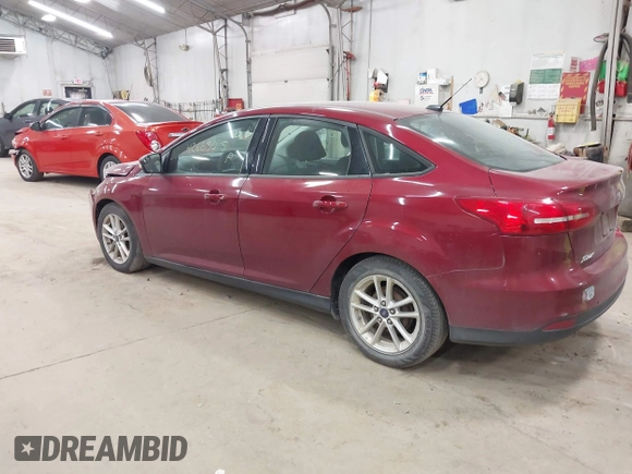2015 Ford Focus SE with VIN 1FADP3F21FL270827, listed as a IAAI auction lot 42665015 with 162,745 mi miles and . Bid and sale history available at DreamBid. Image 3.