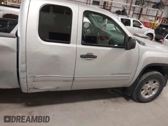 2013 Chevrolet Silverado 1500 LT with VIN 1GCRKSE73DZ328002, listed as a IAAI auction lot 41842745 with 124,496 mi miles and . Bid and sale history available at DreamBid. Image 13.