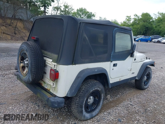 1998 Jeep Wrangler SE with VIN 1J4FY29P0WP792787, listed as a IAAI auction lot 42631661 with 190,180 mi miles and . Bid and sale history available at DreamBid. Image 4.