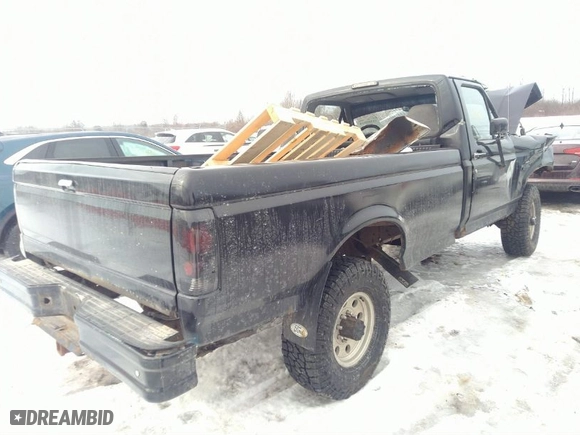 1997 Ford F-250 HD with VIN 1FTHF26F1VEA71176, listed as a IAAI auction lot 41595509 with 136,046 mi miles. Bid and sale history available at carsss.com. Image 4.