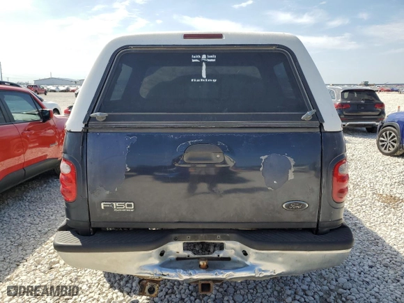2001 Ford F-150 SuperCrew XLT with VIN 1FTRW08W41KF57904, listed as a Copart auction lot 47250035 with 185,985 mi miles and Clean Title. Bid and sale history available at carsss.com. Image 6.
