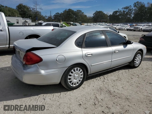 2003 Ford Taurus LX Standard z VIN 1FAFP52U43A110444, wystawiony jako Copart lot #83557764 z przebiegiem 118 897 mil mil oraz Szkoda całkowita • Salvage title. Historia ofert i sprzedaży dostępna na DreamBid. Obrazek 3.