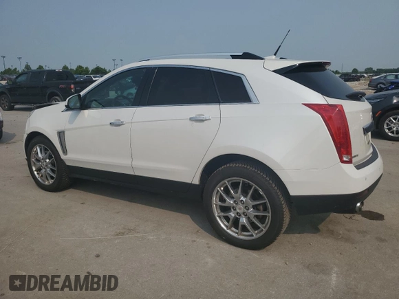 2013 Cadillac SRX Performance Collection with VIN 3GYFNDE30DS568330, listed as a Copart auction lot 59057005 with 163,817 mi miles and Salvage title. Bid and sale history available at DreamBid. Image 2.