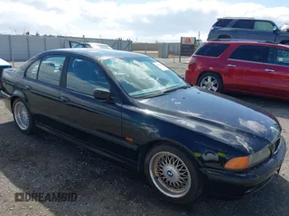 2000 BMW 5 Series 528iA with VIN WBADM6344YGU10257, listed as a IAAI auction lot 41773733 with 231,028 mi miles. Bid and sale history available at carsss.com. Image 1.