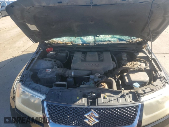 2007 Suzuki Grand Vitara z VIN JS3TE941X74202046, wystawiony jako Copart lot #80221394 z przebiegiem 153 791 mil mil oraz Szkoda całkowita • Salvage title. Historia ofert i sprzedaży dostępna na DreamBid. Obrazek 12.