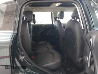 2013 MINI Countryman S with VIN WMWZC3C56DWP24170, listed as a IAAI auction lot 42366594 with 143,311 mi miles and . Bid and sale history available at DreamBid. Image 8.
