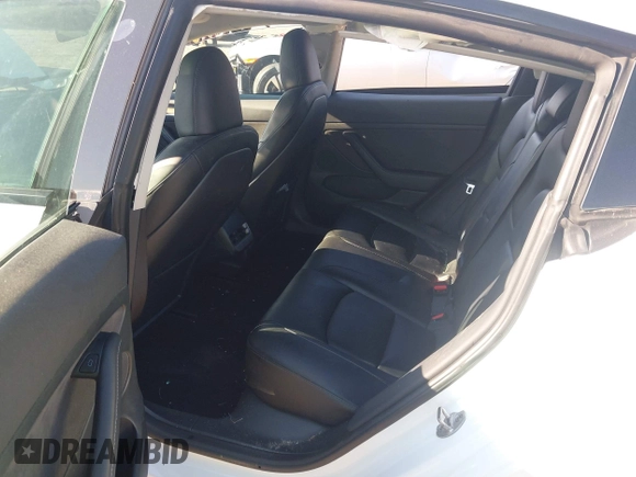 2023 Tesla Model 3 with VIN 5YJ3E1EA9PF557880, listed as a IAAI auction lot 42481413 with 40,582 mi miles and . Bid and sale history available at DreamBid. Image 8.