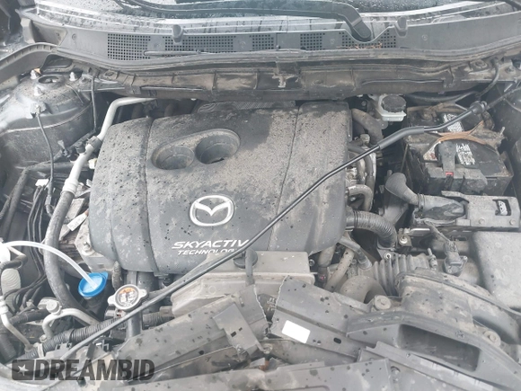 2016 Mazda CX-5 Touring with VIN JM3KE2CY7G0630056, listed as a IAAI auction lot 41817525 with 97,844 mi miles and . Bid and sale history available at DreamBid. Image 10.