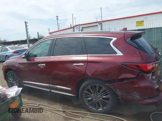 2019 Infiniti QX60 Luxe with VIN 5N1DL0MM5KC515014, listed as a IAAI auction lot 42073879 with 100,566 mi miles and . Bid and sale history available at DreamBid. Image 14.