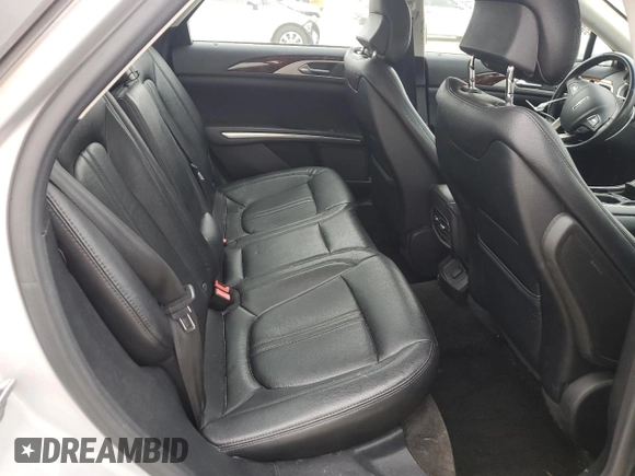 2015 Lincoln MKZ z VIN 3LN6L2G93FR624560, wystawiony jako Copart lot #43999515 z przebiegiem 125 011 mil mil oraz Czysty tytuł • Clean title. Historia ofert i sprzedaży dostępna na DreamBid. Obrazek 11.