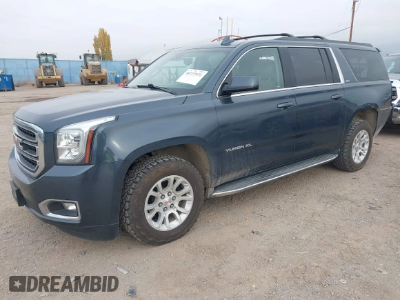 2019 GMC Yukon XL SLT with VIN 1GKS2GKC0KR345860, listed as a IAAI auction lot 40727072 with 127,568 mi miles and . Bid and sale history available at carsss.com. Image 2.
