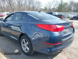2015 Kia Optima LX with VIN 5XXGM4A74FG417988, listed as a IAAI auction lot 41805916 with 135,000 mi miles. Bid and sale history available at carsss.com. Image 3.