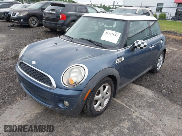 2010 MINI Hardtop with VIN WMWMF3C5XATZ26122, listed as a IAAI auction lot 42377547 with 198,506 mi miles and . Bid and sale history available at DreamBid. Image 2.