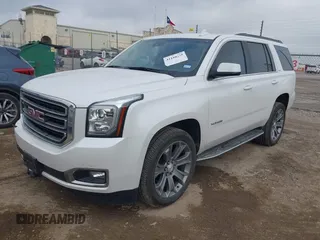 2019 GMC Yukon SLT with VIN 1GKS1BKCXKR329607, listed as a IAAI auction lot 41188239 with 84,940 mi miles. Bid and sale history available at carsss.com. Image 17.
