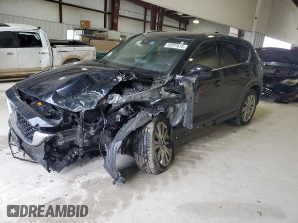 2023 Mazda CX-5 Signature with VIN JM3KFBXY6P0235017, listed as a Copart auction lot 45979615 with 14,487 mi miles and Salvage Title. Bid and sale history available at carsss.com. Image 1.
