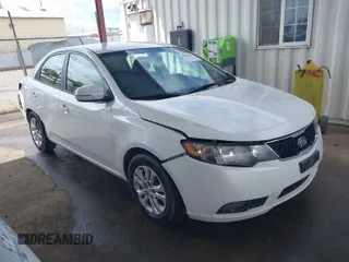 2011 Kia Forte EX with VIN KNAFU4A25B5345288, listed as a IAAI auction lot 41936975 with 232,090 mi miles. Bid and sale history available at carsss.com. Image 1.