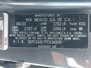 2023 Kia Forte LXS with VIN 3KPF24AD7PE634209, listed as a IAAI auction lot 42046423 with 37,542 mi miles and . Bid and sale history available at DreamBid. Image 9.