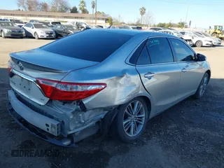 2015 Toyota Camry XLE with VIN 4T1BF1FK7FU886921, listed as a IAAI auction lot 41626611 with 171,377 mi miles. Bid and sale history available at carsss.com. Image 4.