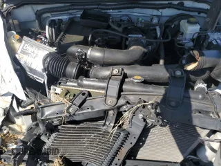 2015 Nissan Frontier S z VIN 1N6BD0CT8FN733537, wystawiony jako Copart lot #52552845 z przebiegiem Nie podano mil oraz Szkoda całkowita • Salvage title. Historia ofert i sprzedaży dostępna na DreamBid. Obrazek 12.