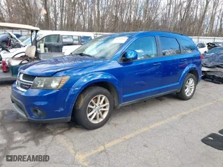 2015 Dodge Journey SXT with VIN 3C4PDCBG1FT743938, listed as a IAAI auction lot 40789907 with 124,781 mi miles. Bid and sale history available at carsss.com. Image 2.