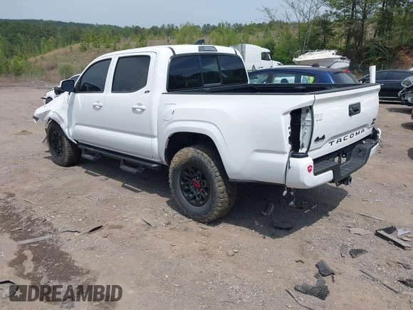 2021 Toyota Tacoma 4WD SR with VIN 3TMCZ5AN2MM414975, listed as a IAAI auction lot 41997227 with 57,729 mi miles. Bid and sale history available at carsss.com. Image 3.