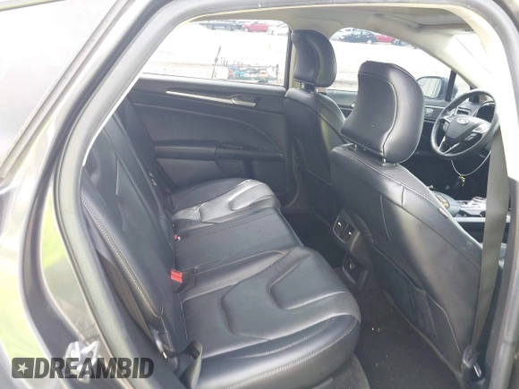 2017 Ford Fusion Titanium with VIN 3FA6P0K98HR363360, listed as a IAAI auction lot 42461432 with 182,807 mi miles and . Bid and sale history available at DreamBid. Image 8.