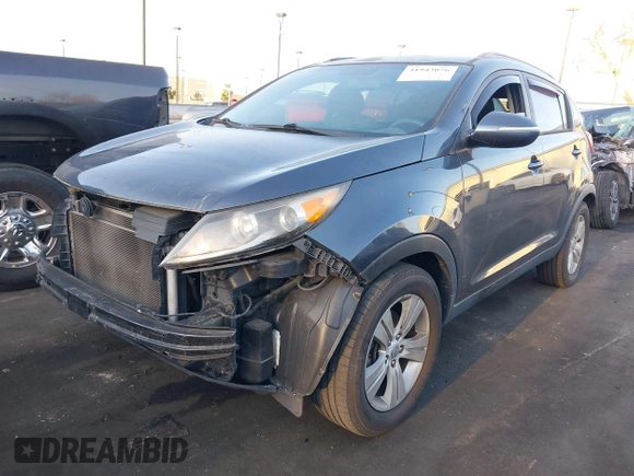 2013 Kia Sportage LX with VIN KNDPB3A24D7478526, listed as a IAAI auction lot 41943076 with 106,109 mi miles and . Bid and sale history available at carsss.com. Image 2.