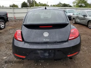 2014 Volkswagen Beetle Turbo R-Line with VIN 3VWVT7AT2EM603435, listed as a Copart auction lot 72755524 with 99,300 mi miles and Salvage Title. Bid and sale history available at DreamBid. Image 6.