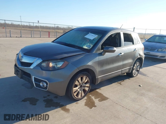 2012 Acura RDX Tech Pkg with VIN 5J8TB2H57CA000824, listed as a IAAI auction lot 41771611 with 265,417 mi miles. Bid and sale history available at carsss.com. Image 2.