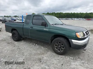 2000 Nissan Frontier XE with VIN 1N6DD26SXYC400648, listed as a Copart auction lot 58756855 with 148,051 mi miles and Salvage title. Bid and sale history available at DreamBid. Image 4.