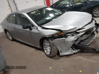 2019 Toyota Camry LE z VIN 4T1B11HK5KU814007, wystawiony jako IAAI lot #42099677 z przebiegiem 91 779 mil mil oraz . Historia ofert i sprzedaży dostępna na DreamBid. Obrazek 1.