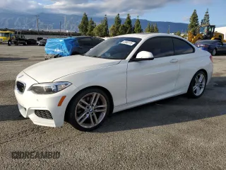 2015 BMW 2 Series 228i with VIN WBA1F9C54FVW98698, listed as a Copart auction lot 47660115 with 91,221 mi miles and Salvage Title. Bid and sale history available at carsss.com. Image 1.