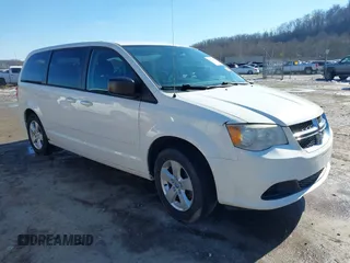 2013 Dodge Grand Caravan SE with VIN 2C4RDGBG0DR760598, listed as a IAAI auction lot 41590428 with 182,847 mi miles and . Bid and sale history available at DreamBid. Image 1.