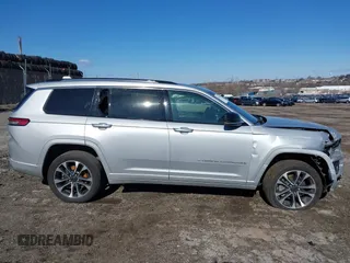 2021 Jeep Grand Cherokee Overland with VIN 1C4RJKDG0M8122002, listed as a IAAI auction lot 41748944 with 88,336 mi miles and . Bid and sale history available at DreamBid. Image 13.