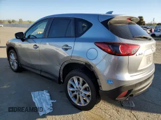 2014 Mazda CX-5 Grand Touring with VIN JM3KE2DY8E0412025, listed as a Copart auction lot 42863655 with 72,416 mi miles and Salvage Title. Bid and sale history available at carsss.com. Image 2.