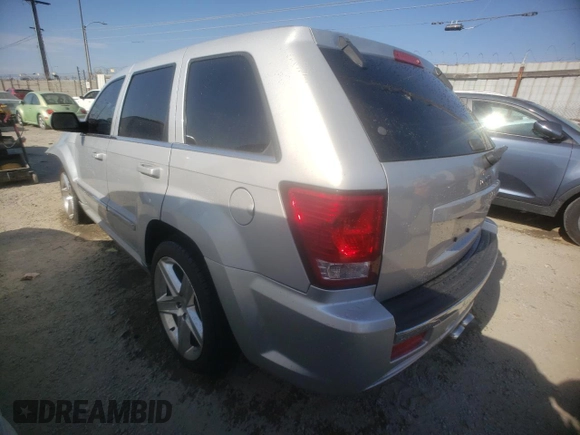 2008 Jeep Grand Cherokee SRT-8 with VIN 1J8HR78358C192213, listed as a Copart auction lot 63658294 with 126,140 mi miles and Salvage Title. Bid and sale history available at carsss.com. Image 2.